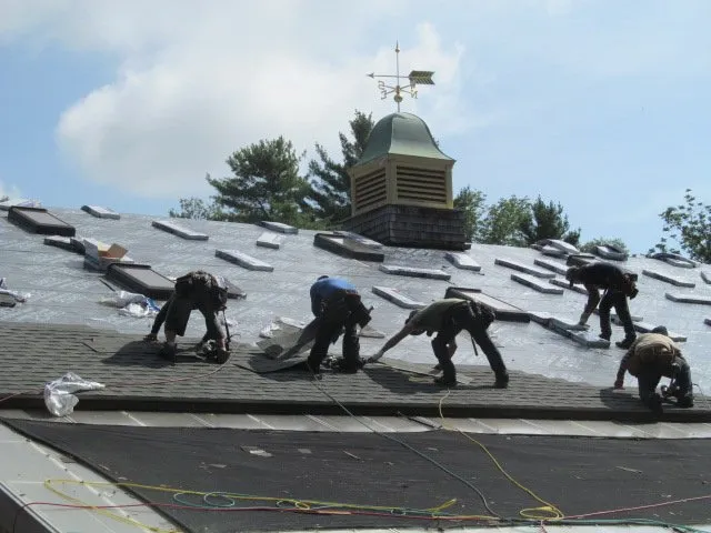 Slide of Prestige Roofing