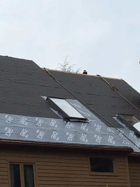 Slide of Prestige Roofing
