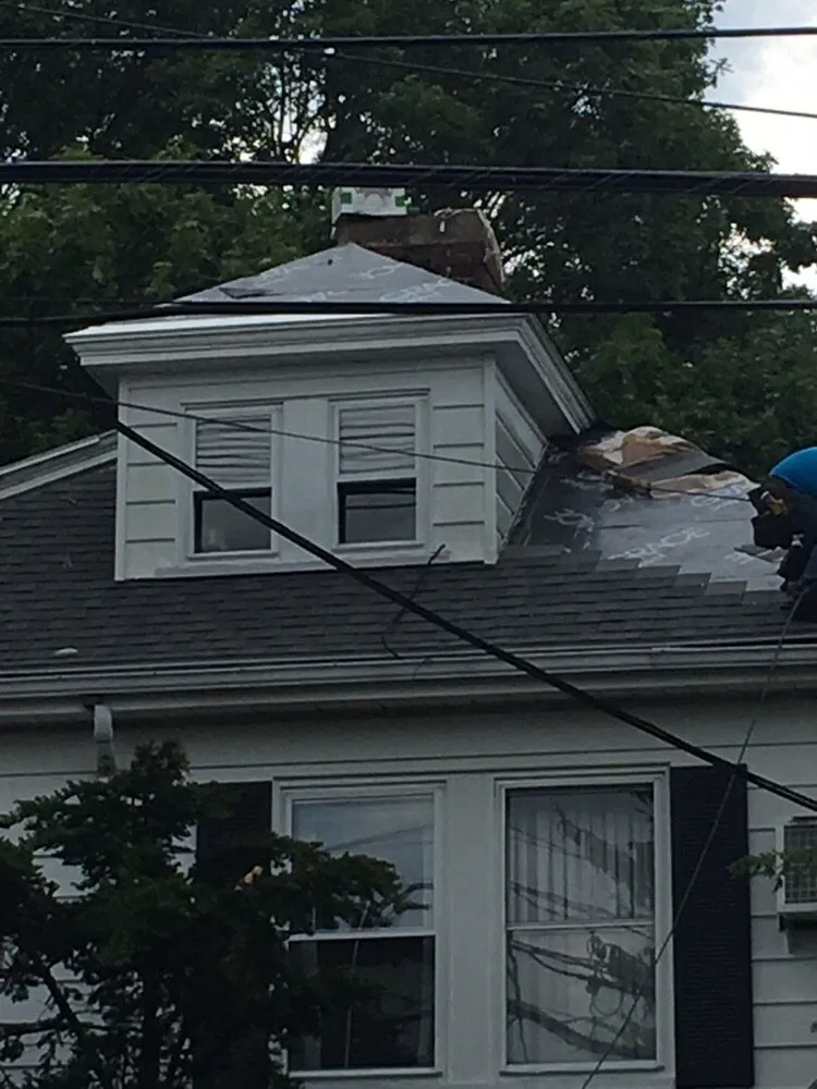 Slide of Prestige Roofing