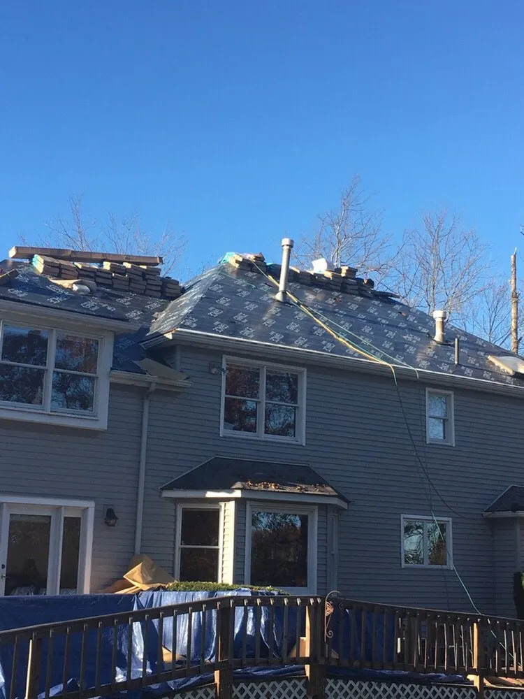 Slide of Prestige Roofing