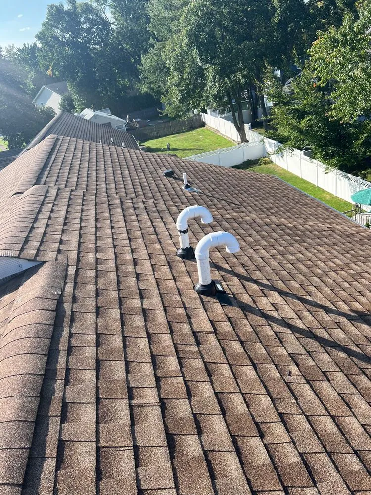 Slide of Prestige Works Roofing & Siding