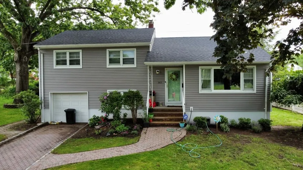 Slide of Prestige Works Roofing & Siding