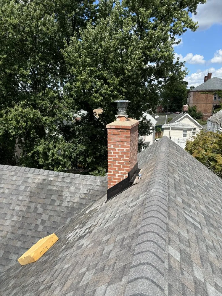 Slide of Prestige Works Roofing & Siding