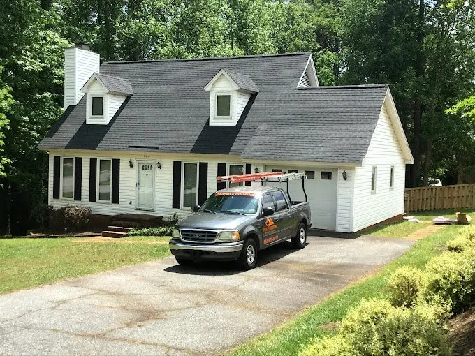 Slide of Price Roofing