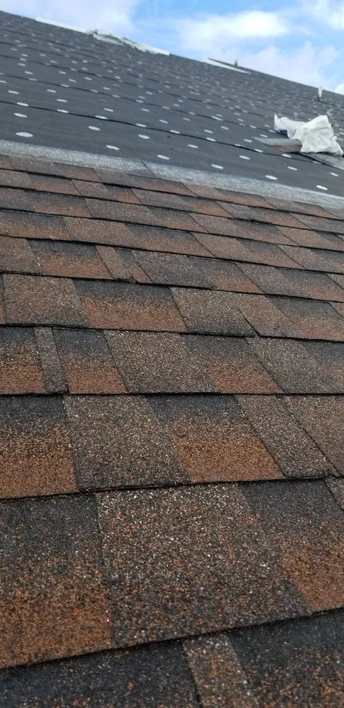 Slide of Priceless Roofing