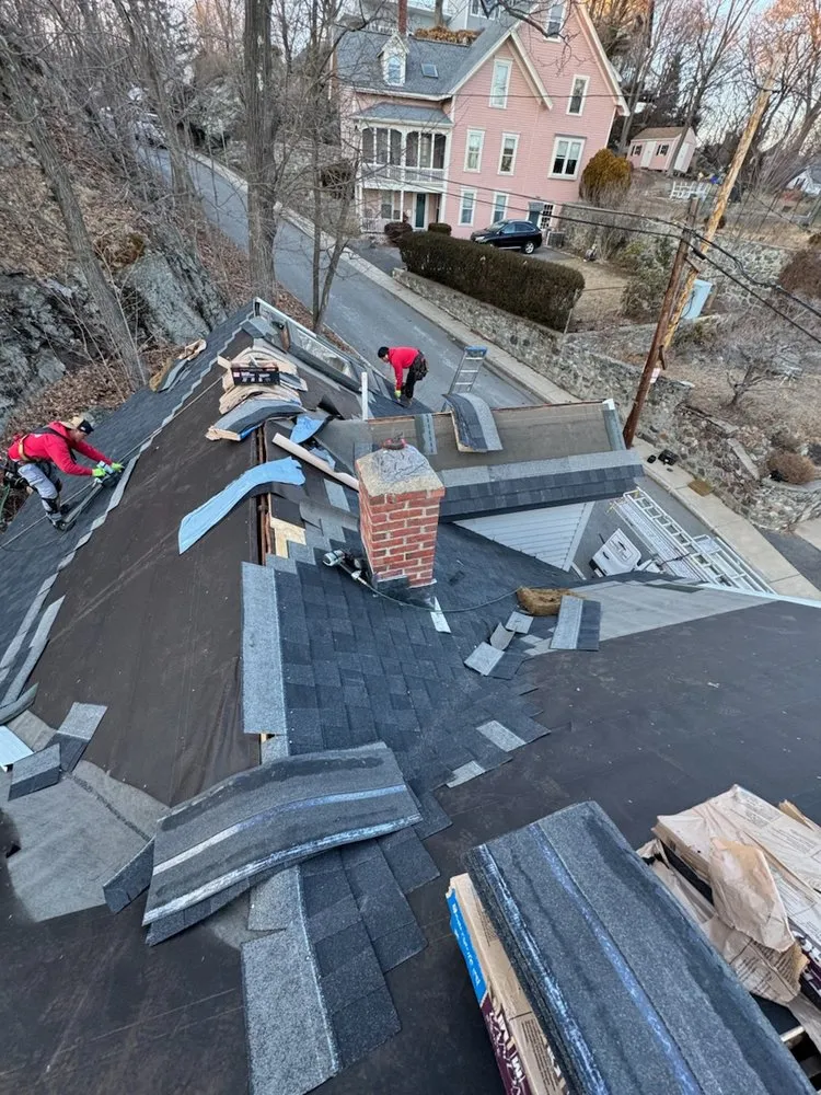 Licensed roof inspection experts serving North Attleboro, MA - Pride Exteriors