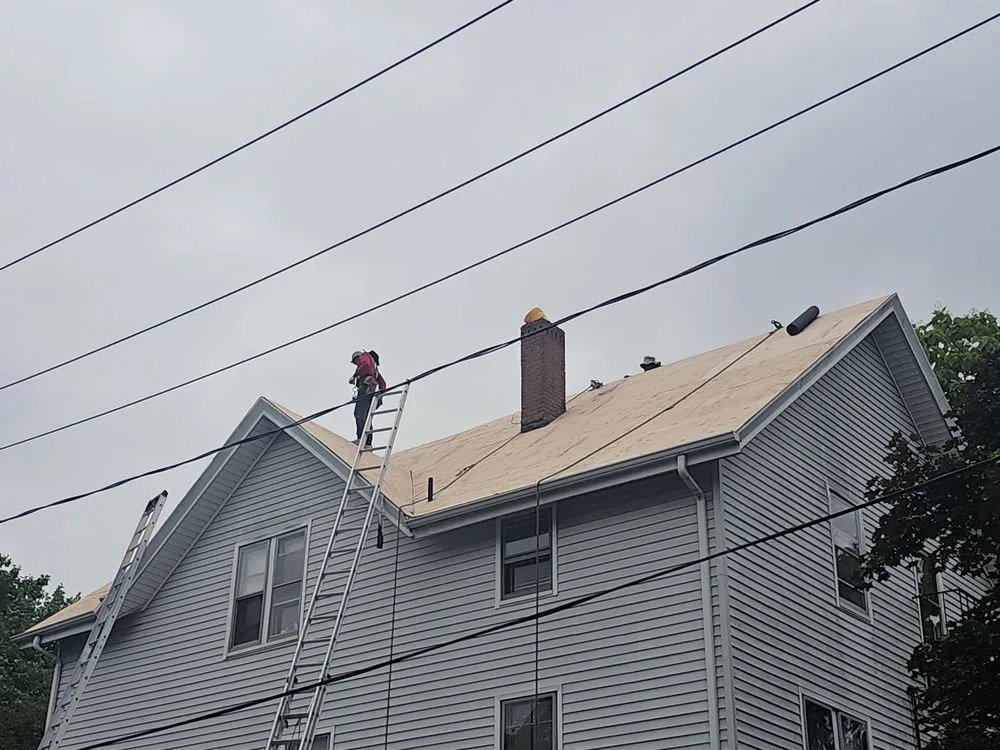 Local flat roof repair in North Attleboro, MA - Pride Exteriors
