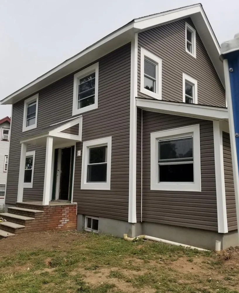 Slide of Pride Roofing and Chimney