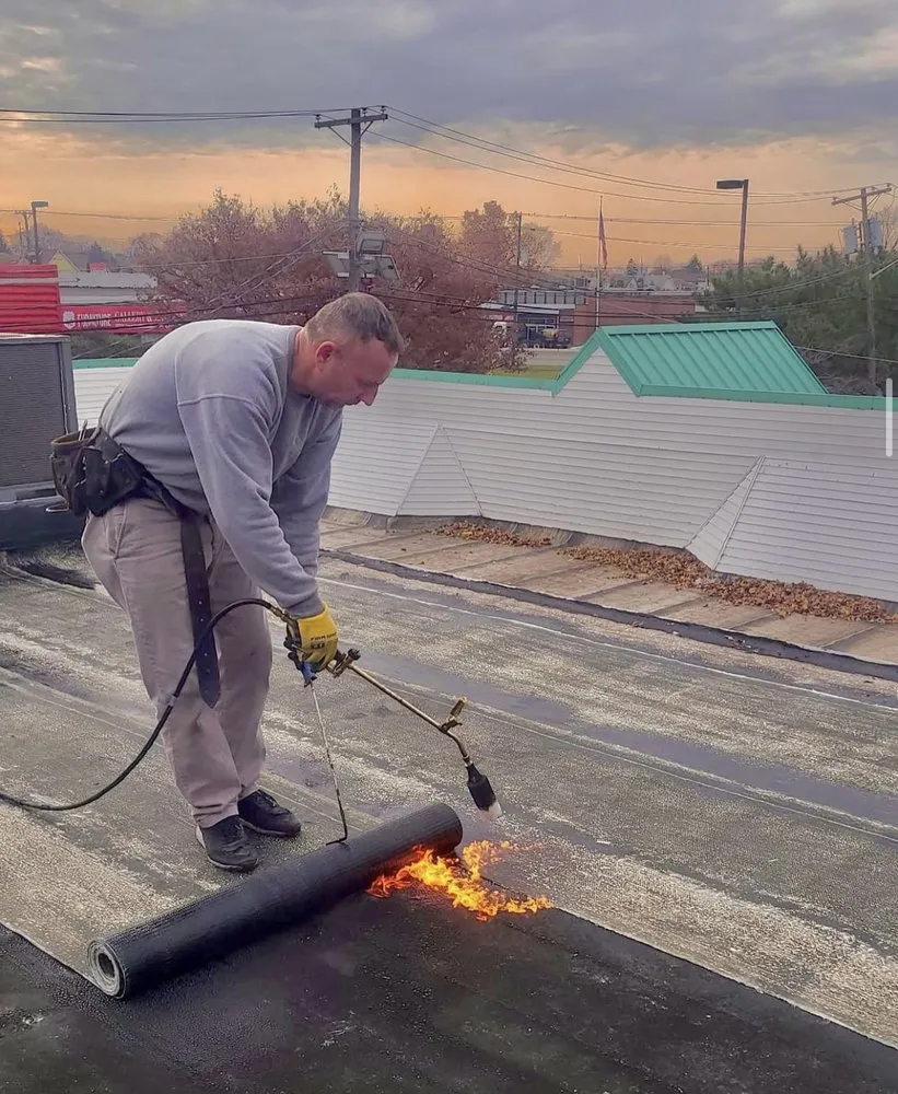 Slide of Pride Roofing and Chimney