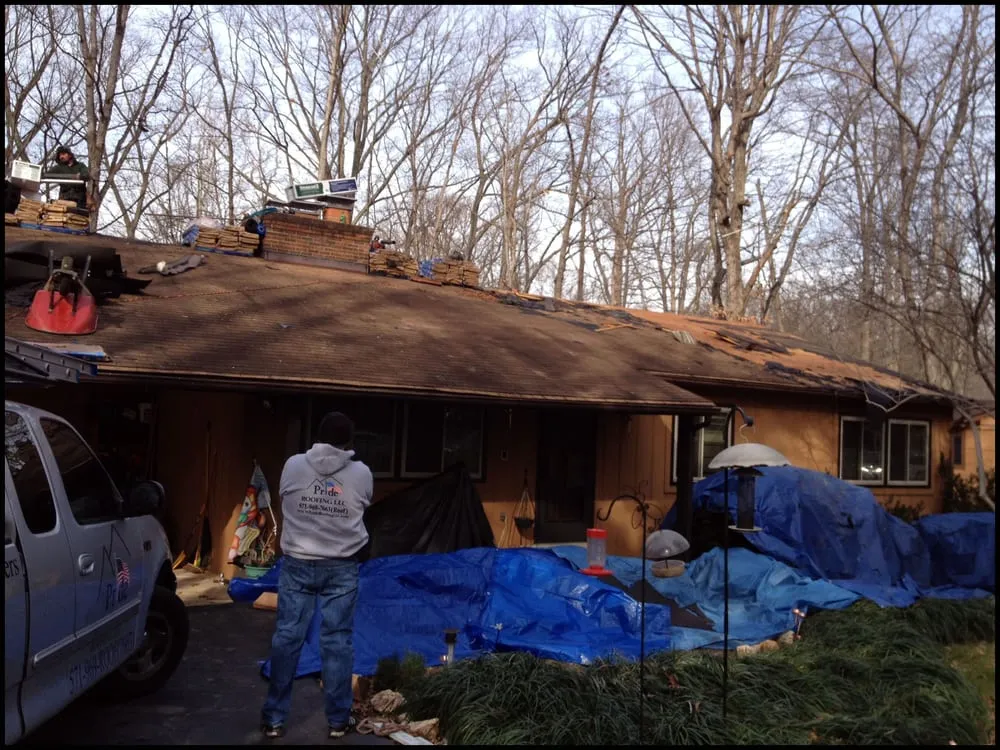 Slide of Pride Roofing