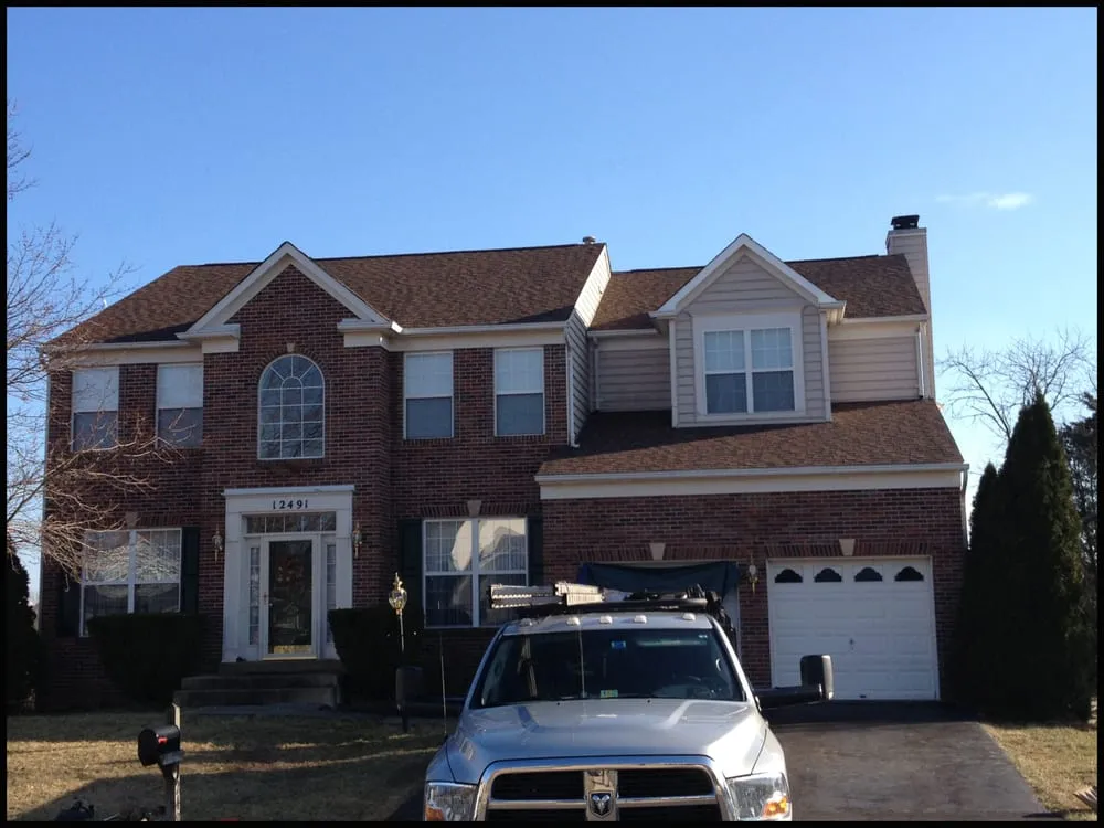 Slide of Pride Roofing