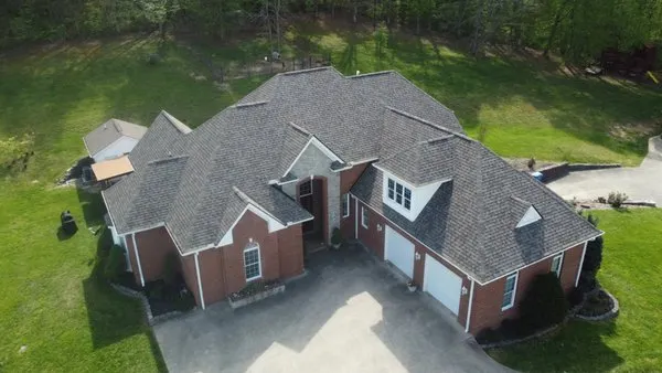 PrimeTime Roofing & Gutters Logo