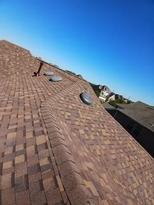 Principio Y Fin Roofing Logo