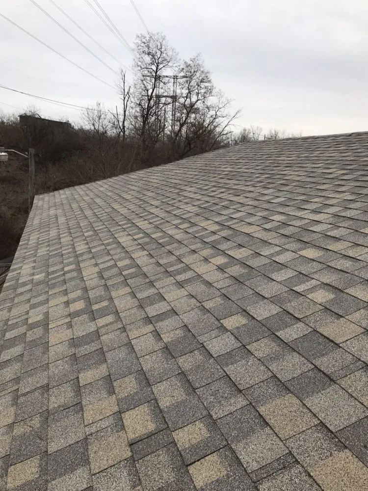 Slide of Pring & Sons Roofing