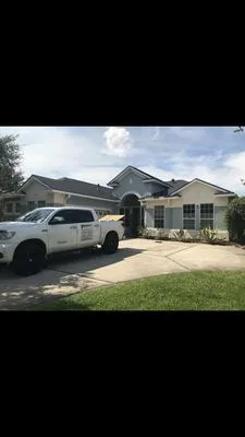 Priority 1 Roofing and Construction Logo