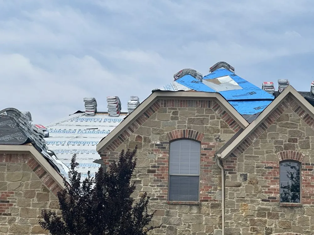 Slide of Priority Roofing