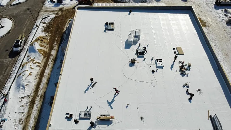 Professional flat roof repair in Township Of Kenockee, MI by Pristine Roofing