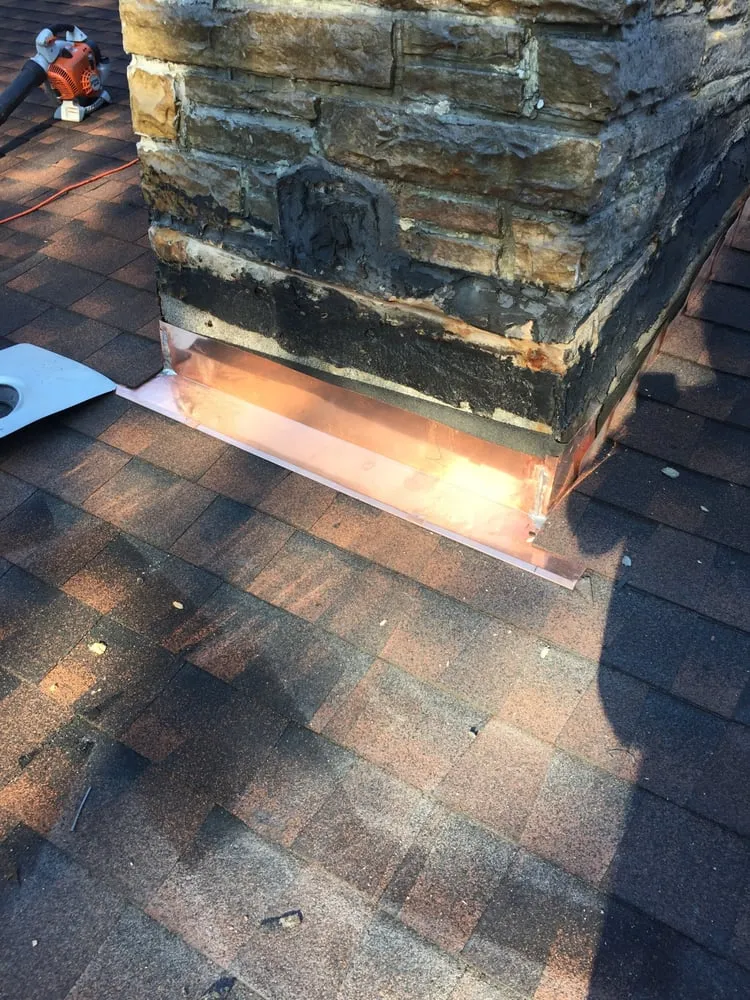 Slide of Prizio Roofing & Siding