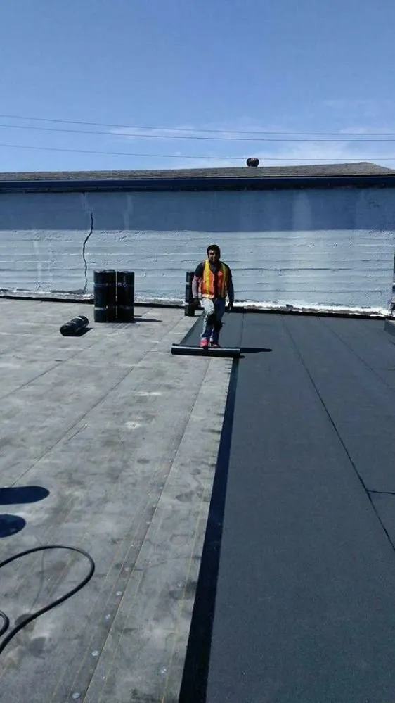 Slide of Pro-Cover Roofing