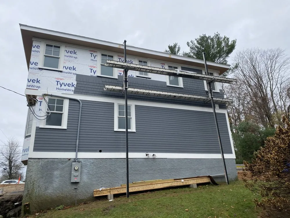 Slide of Pro Exteriors New Englang