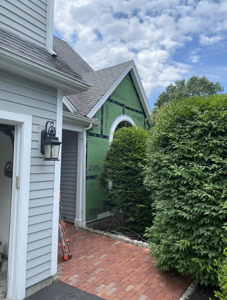 Slide of Pro Exteriors New Englang