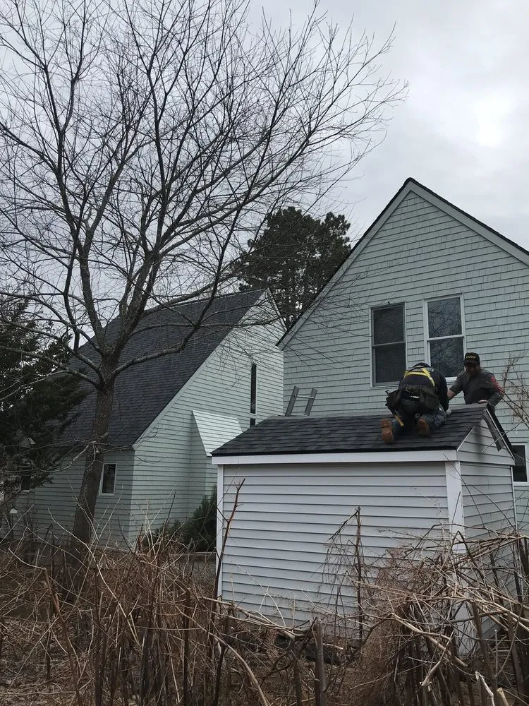 Slide of Pro Roofers