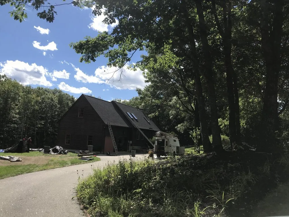 Slide of Pro Roofers