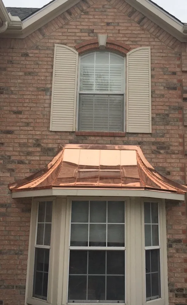 Emergency storm damage roof repair for homes in Ofallon, MO by Pro Roofing & Restoration