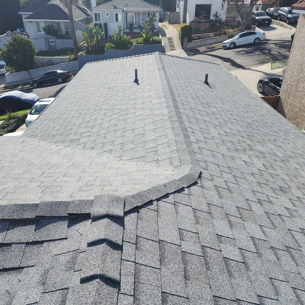 Slide of Pro Roofing Experts