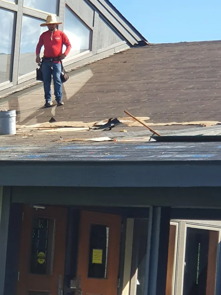 Slide of Pro Roofing Group