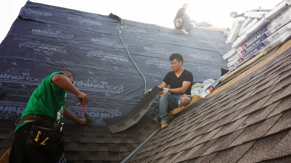 Slide of Pro Roofing KC