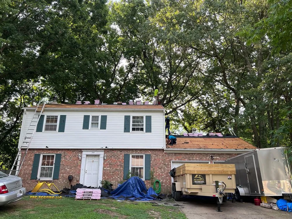 Slide of Pro Roofing