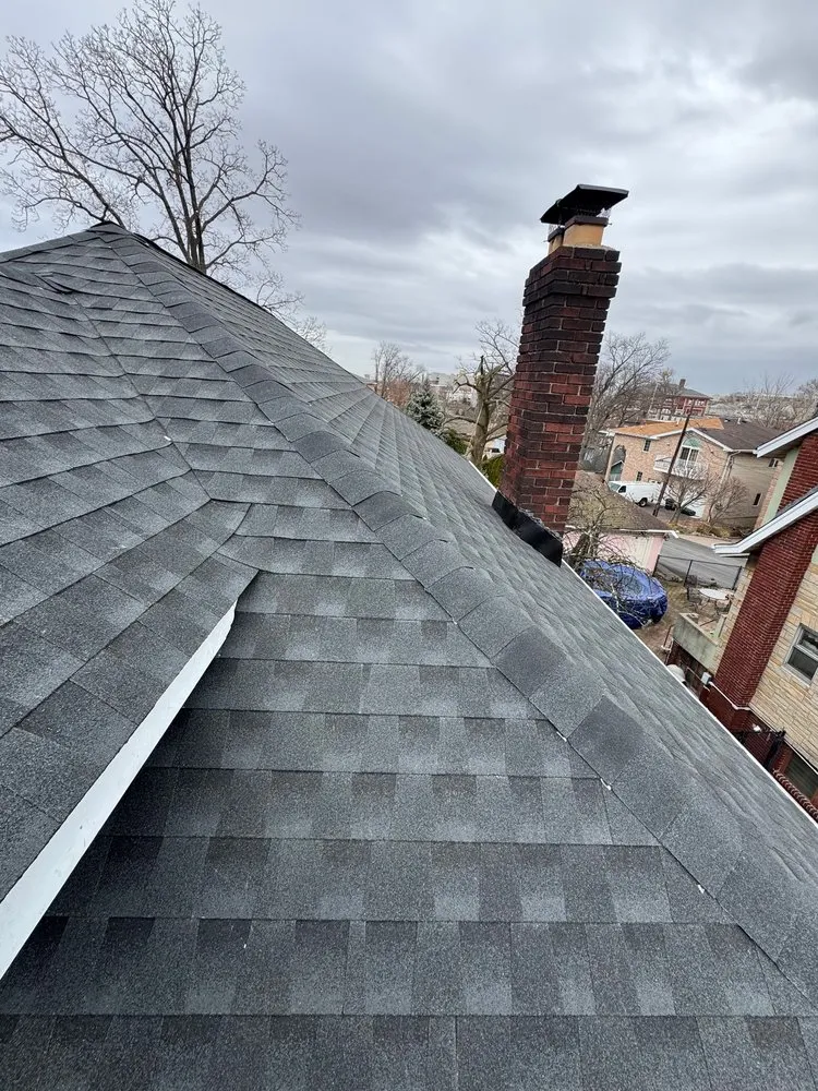 Slide of Pro Touch Roofing