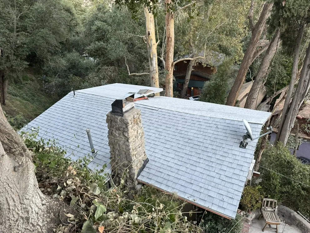 Professional storm damage roof repair for homes in Tarzana, CA by Professional Home Remodeling