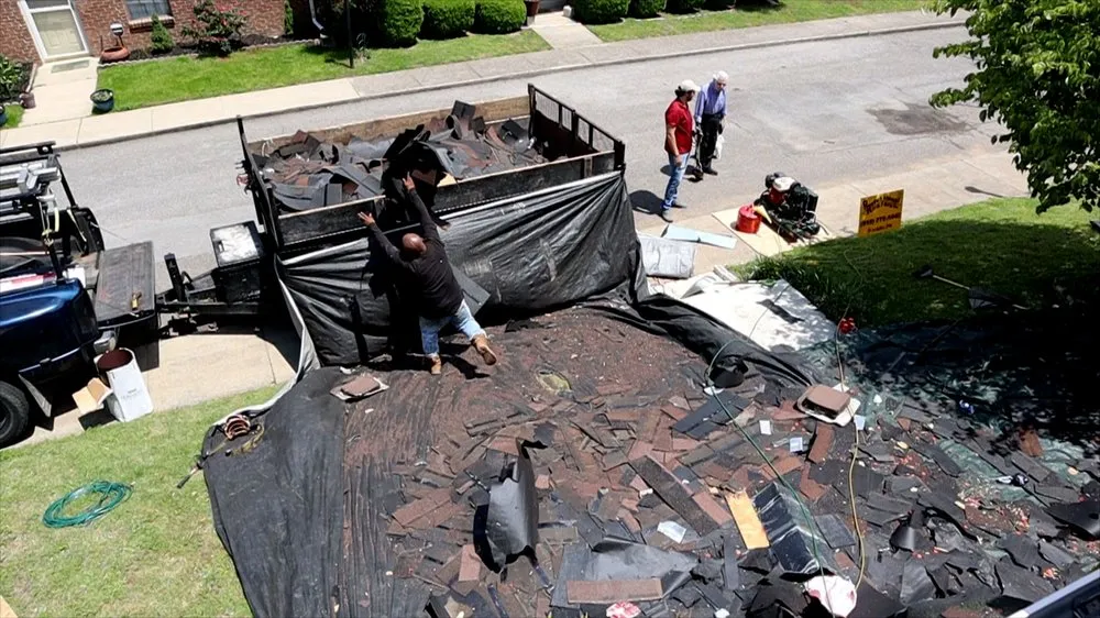 Slide of Professional Roofers