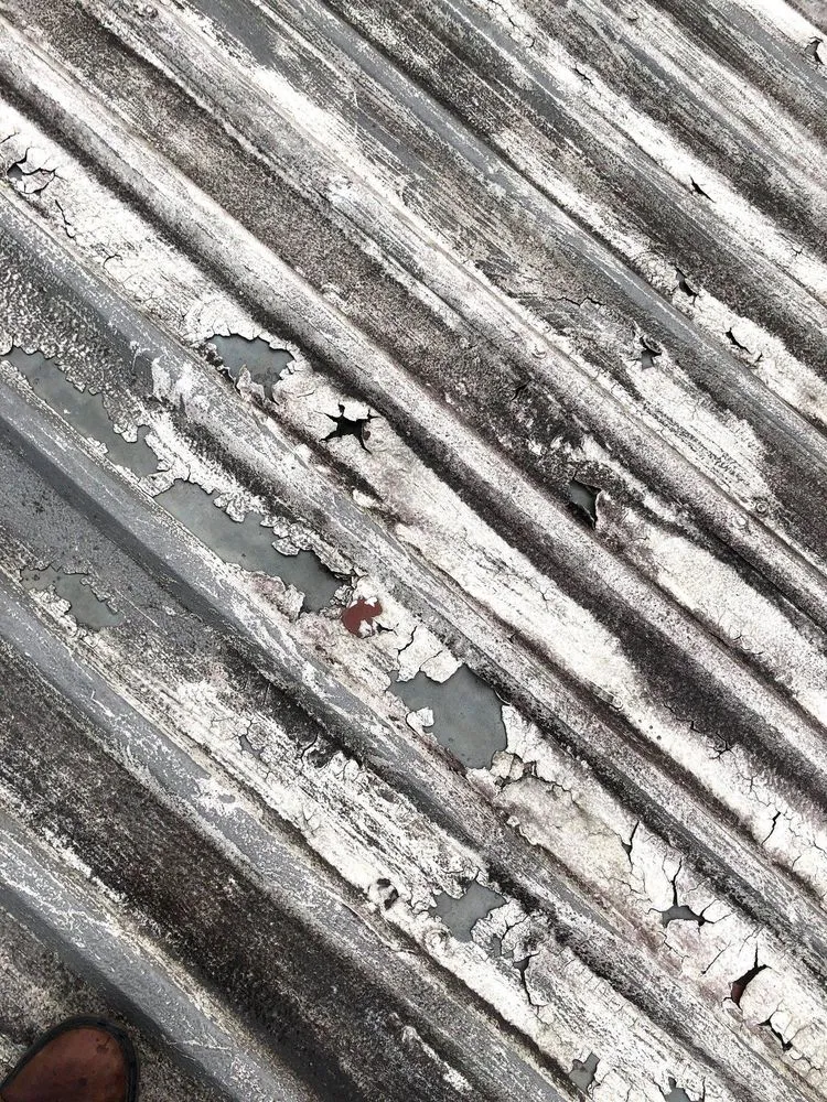 Slide of Professional Rooftop Services