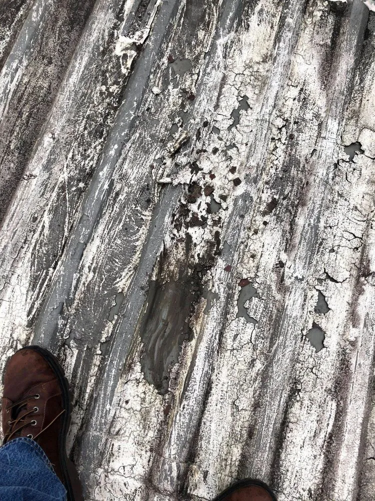 Slide of Professional Rooftop Services