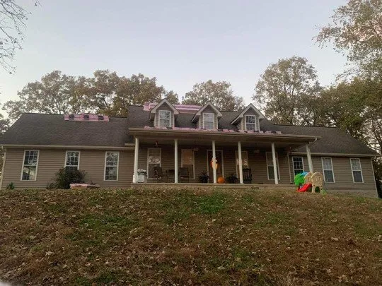 Slide of Proffitts Roofing & More