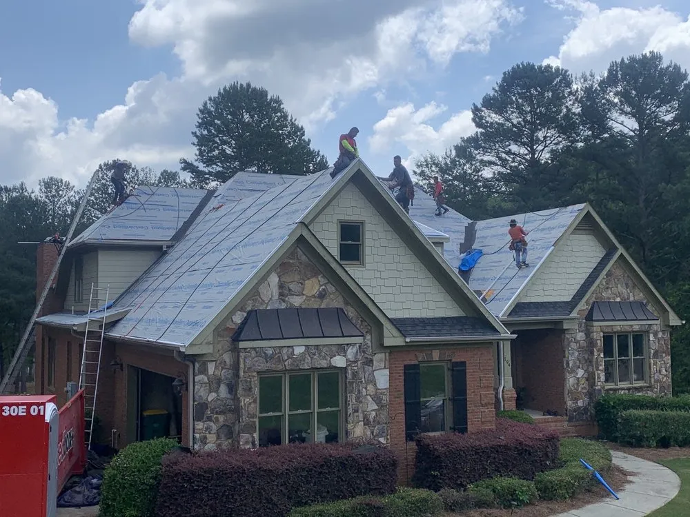 Slide of ProsTouch Roofing