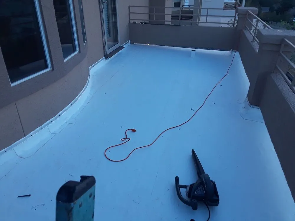 Slide of Pueblo Roofing