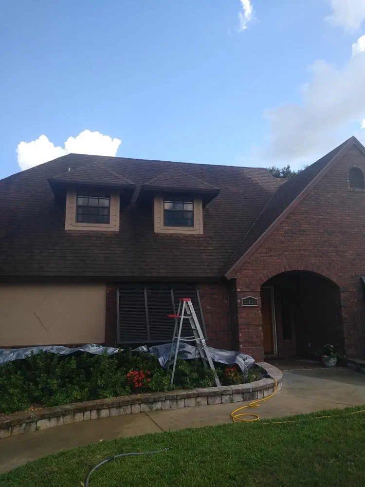 Slide of Pure Flow Soft Wash and Pressure Washing