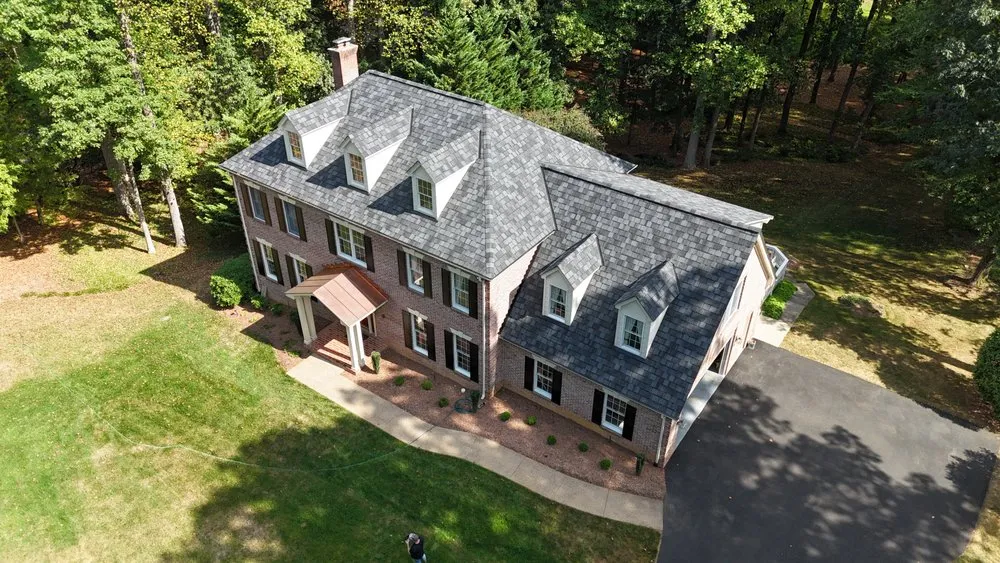 Slide of Pure Roofing