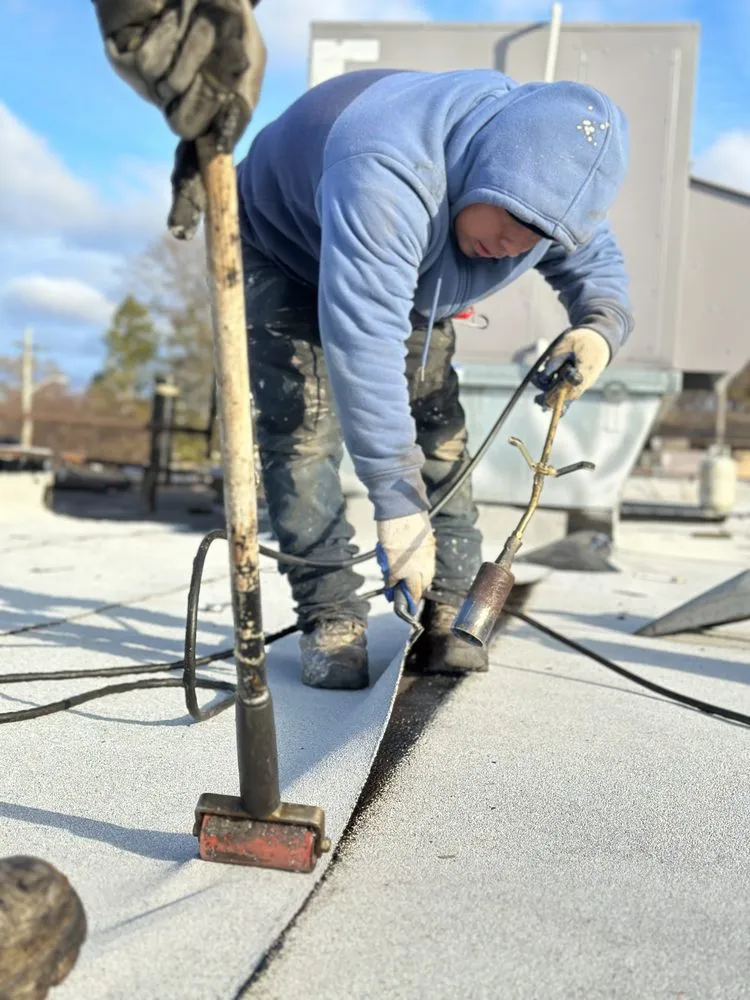 Slide of Pyramid Roofing