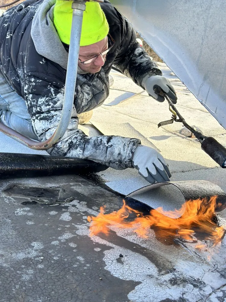 Slide of Pyramid Roofing