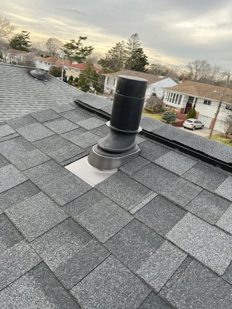 Slide of QB Roofing Solutions