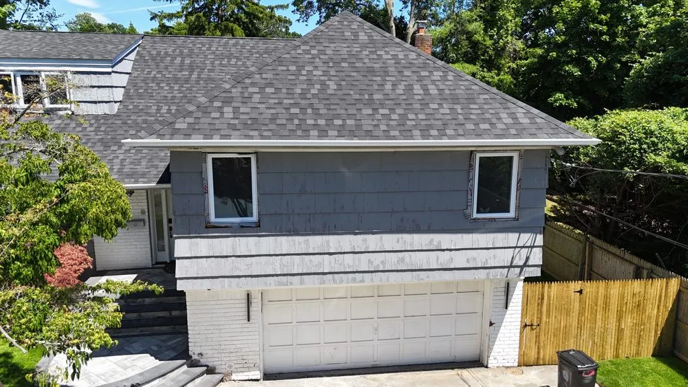 Slide of QB Roofing Solutions