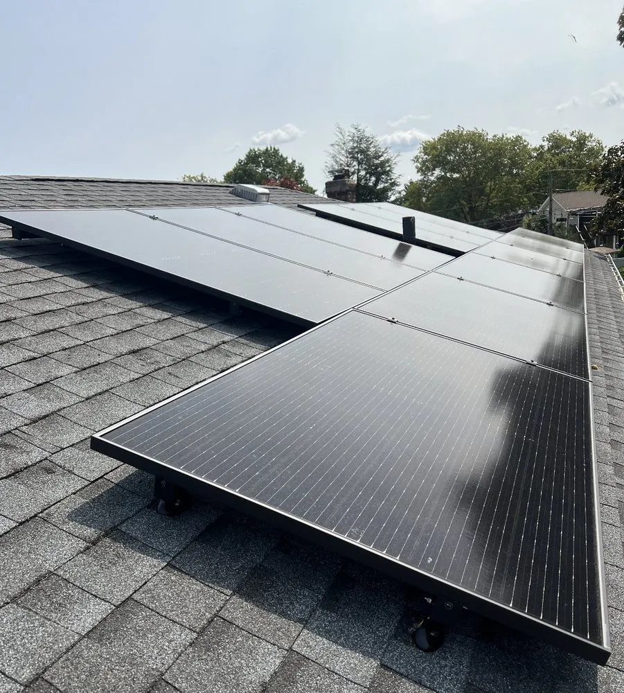 Slide of QB Roofing Solutions