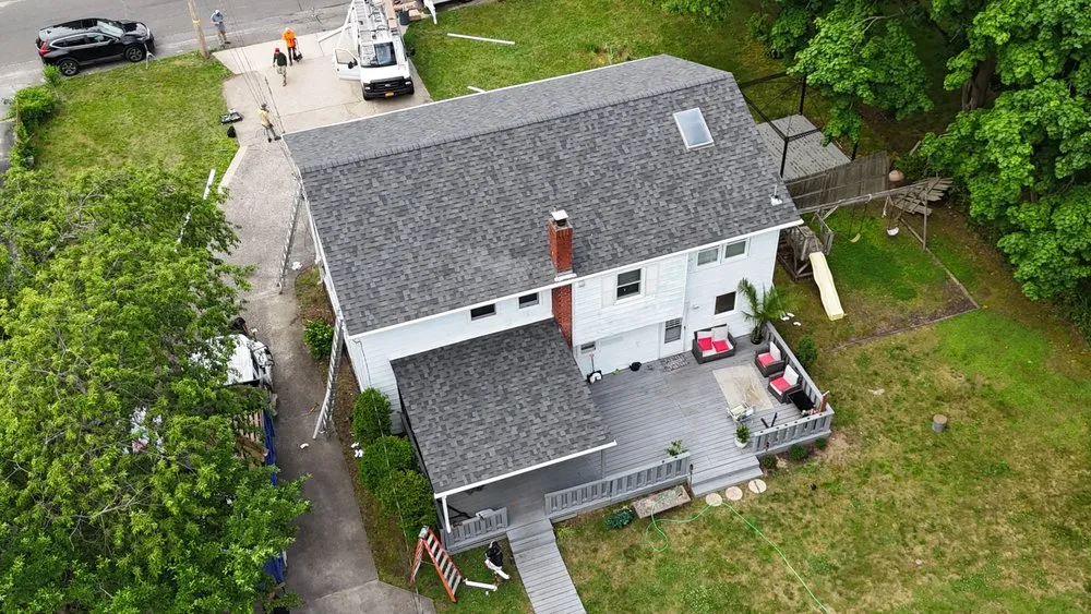 Slide of QB Roofing Solutions