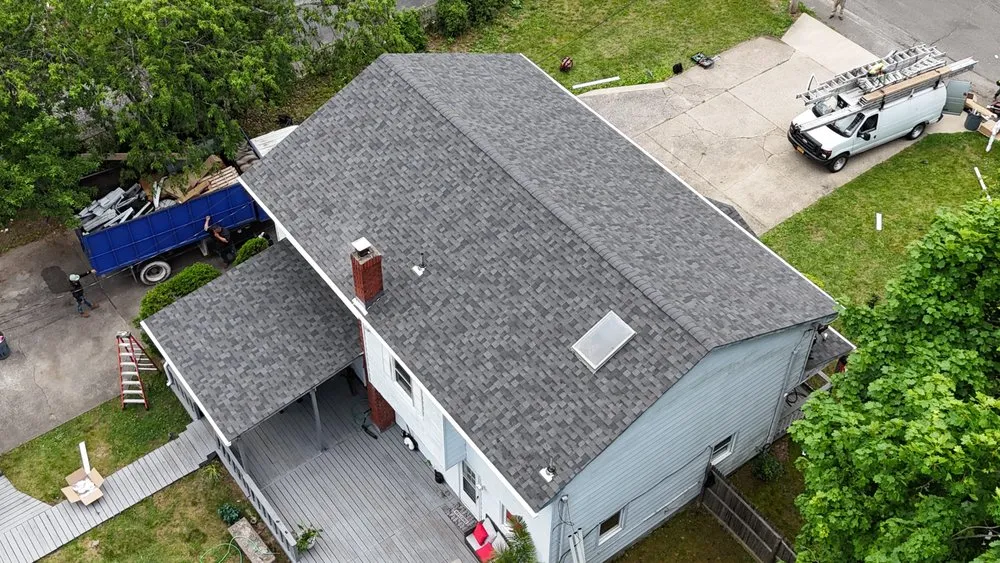 Slide of QB Roofing Solutions