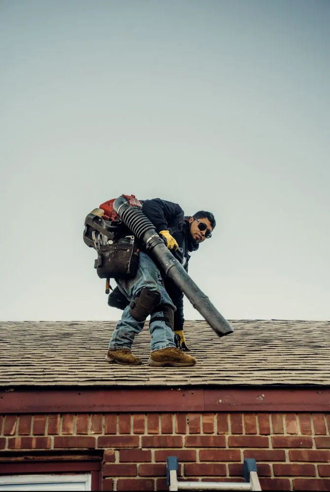 Slide of QB Roofing Solutions